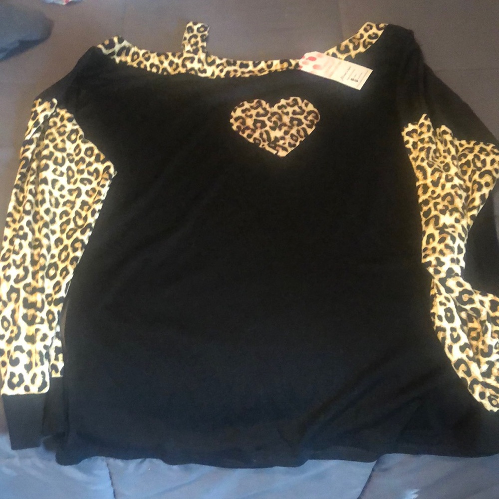 Brand new. Never worn. New with tags. Off the shoulder on one side.